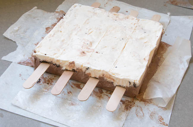 Adding Popsicle Sticks to the Ice Cream Cake Pops | Erin Bakes