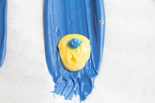 Piping Royal Blue Chocolate onto the Feather | Erin Gardner | ErinBakes