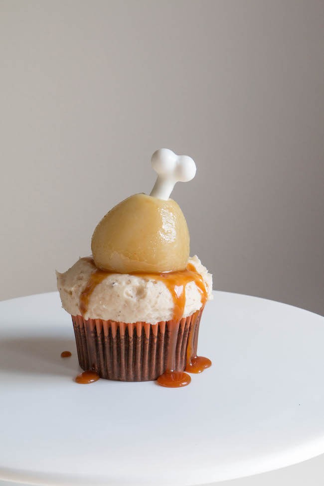 Gingerbread Cupcake with Brown Butter Cream Cheese Frosting, Caramel Sauce, and a Poached Pear Turkey Leg | Erin Bakes