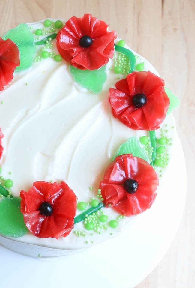 Fruit Roll-Up Flowers on a Cake with Candy Leaves | Erin Bakes